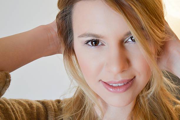 istock Beautiful blonde woman smiling 470335888