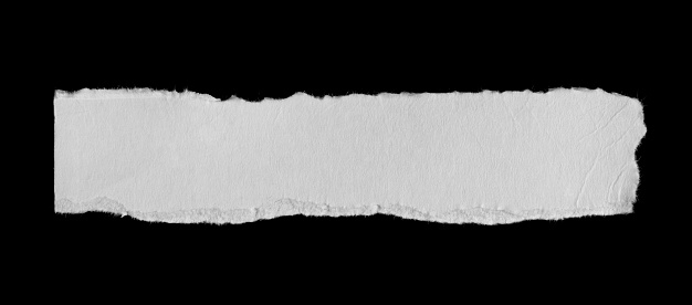 Piece of a paper isolated on black