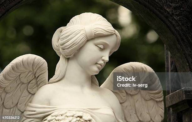 Angel With A Female Face Stock Photo - Download Image Now - 2015, Adult, Cemetery