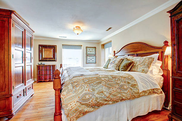 istock Large rustic furnished bedroom 470336301