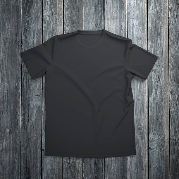istock Black t-shirt on wooden background 470336964
