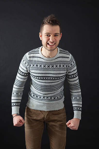 istock Handsome men doing different expressions in different sets of clothes 470337178