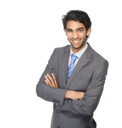 Close up portrait of a smiling business man with arms crossed isolated on white