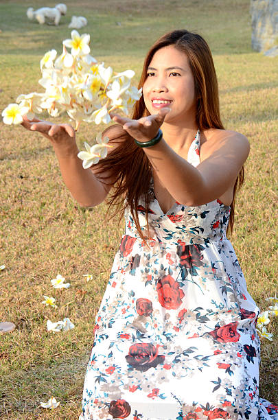 istock Woman flow white flowers 470339967