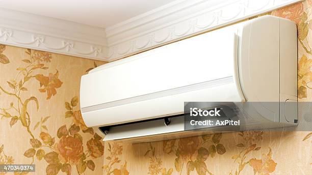 Aire Acondicionado En Casa Interior Foto de stock y más banco de imágenes de Inversor de corriente - Inversor de corriente, Aparato de aire acondicionado, 2015