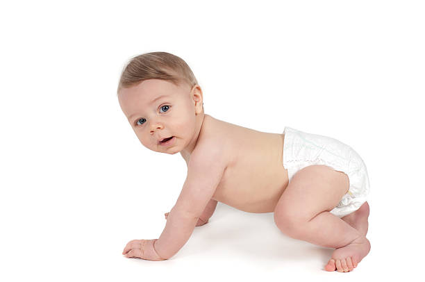 istock Side view of cute small crawling baby 470341341