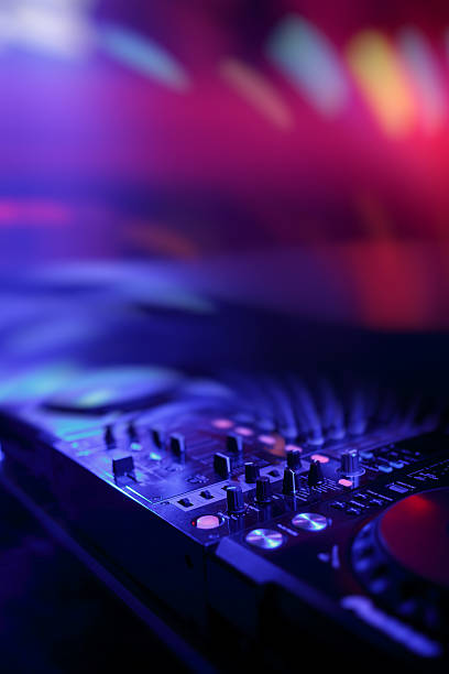 istock DJ mixer with light colored spotlights discos 470343332