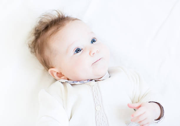 istock Curious baby girl with beautiful blue eyes 470346859