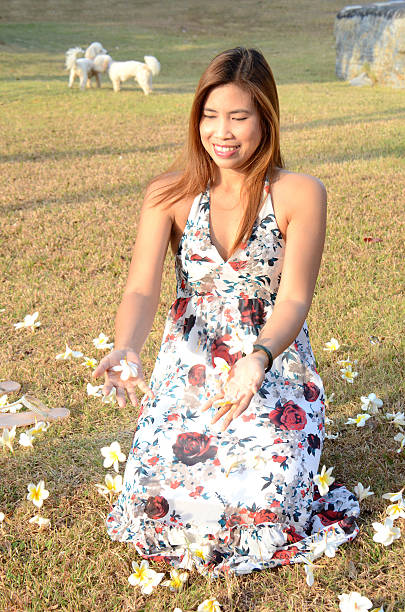 istock Woman flow white flowers 470349753