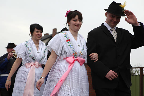 Turnow, Germany - March 13, 2011: Young people in Sorbian costumes attend the Zapust Carnival in the Lusatian village of Turnow near Cottbus, Lower Lusatia, Brandenburg, Germany.