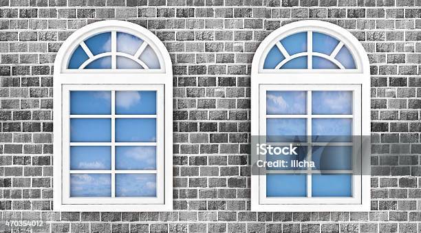 Windows On Brick Wall With Reflection Of Sky In Them Stock Photo - Download Image Now