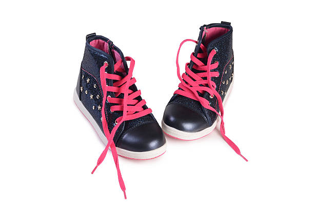 istock Children's stylish sneakers isolated on white 470355972