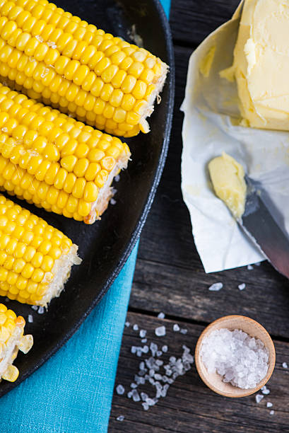 istock hot golden corn cob with butter and salt 470358428