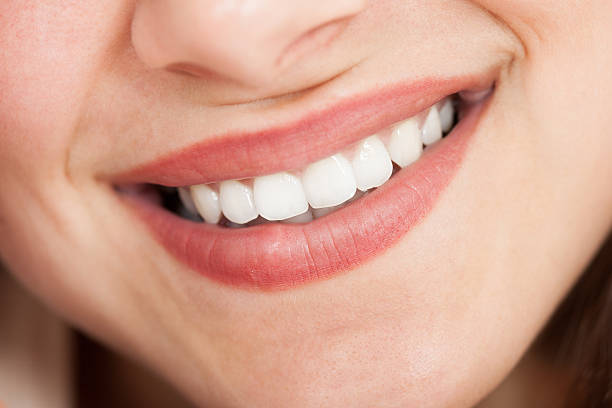 istock Cropped Image Of Woman Smiling 470358434