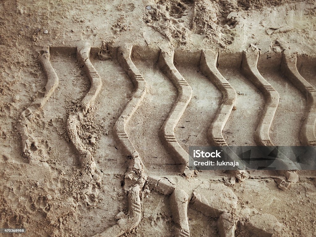 Wheel tracks Wheel tracks on the soil. 2015 Stock Photo