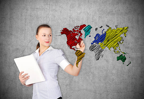 istock businesswoman drawing world map 470369218