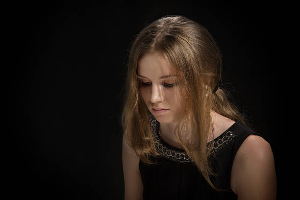 istock sad pensive girl 470369604