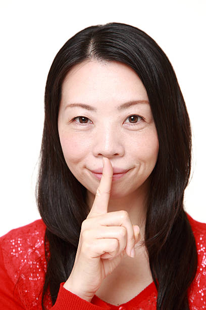 istock Japanese woman whith silence gestures 470375282