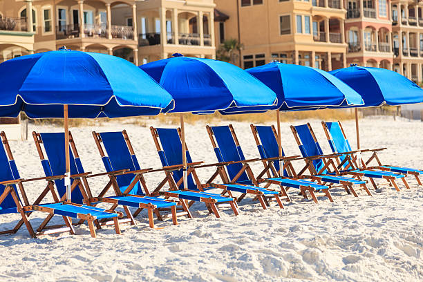 istock Lounge chairs and umbrellas on a beach 470383957