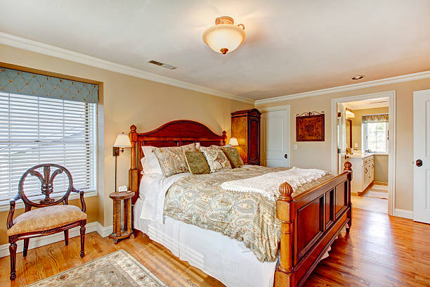 istock Large rustic furnished bedroom 470392373