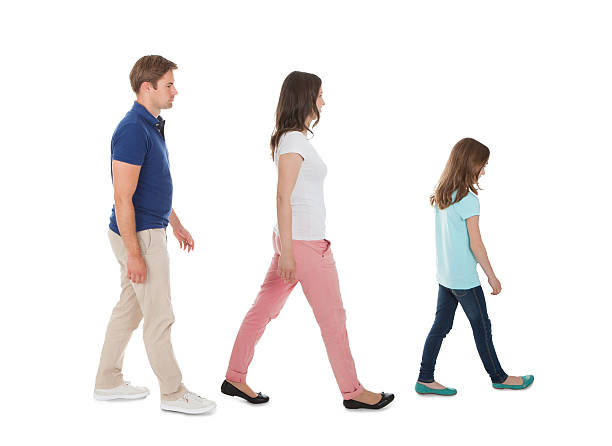 istock Family walking in order of height 470403716