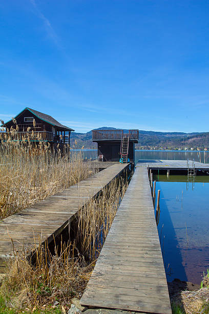 Lake Woerth Jetty Taken on April 15th 2015 during a break at university on a warm and sunny day in spring. Decided to use a few hours to enjoy the afternoon at the southside of Lake Woerth! maria woerth stock pictures, royalty-free photos & images