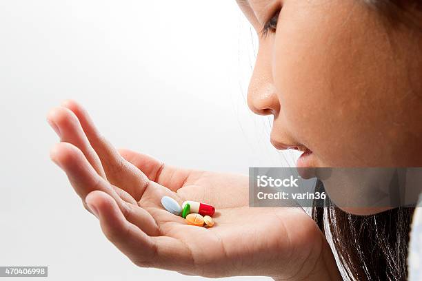 Take A Pill Stock Photo - Download Image Now - 2015, Adult, Antibiotic