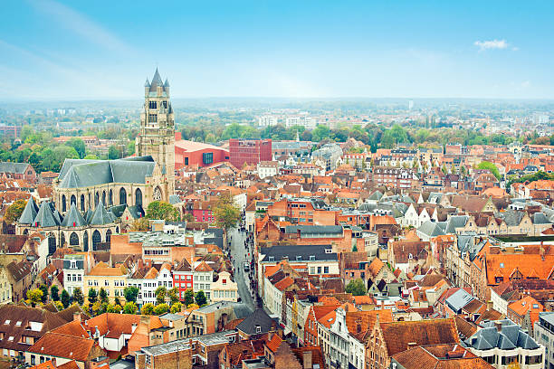 Bruges, Belgium View to the red roofs and beautiful St. Salvator's Cathedral in sunrise st salvator's cathedral stock pictures, royalty-free photos & images
