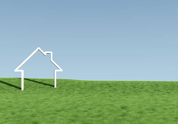 wooden house and lawn at sunset
