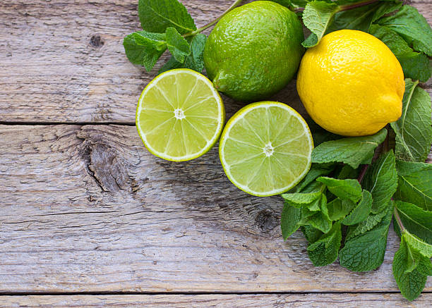 istock Juicy ripe citrus on an old wooden table 470419798