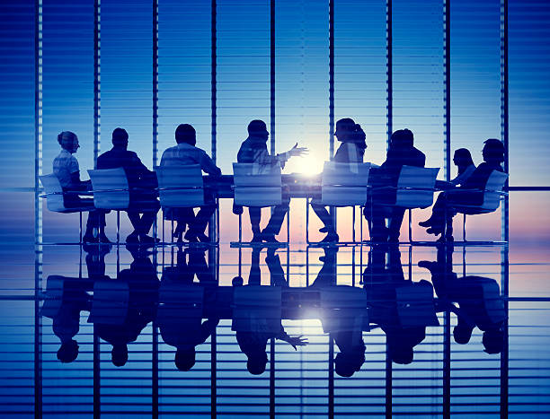 istock Business People Talking in a Board Room 470420116