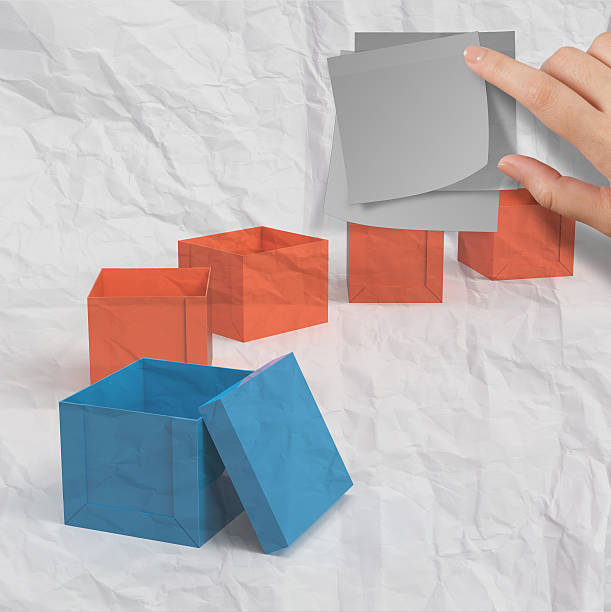 istock thinking outside the box on crumpled sticky note paper 470421987
