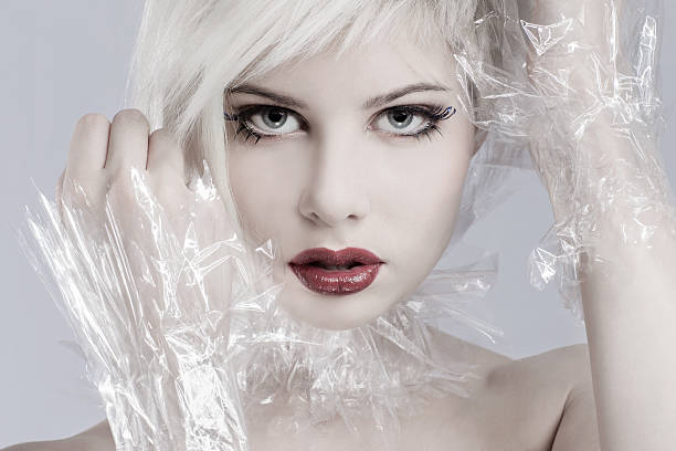 istock Blonde woman model in plastic 470429321