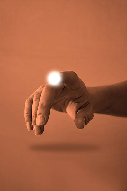 istock Right Hand Touching A Touchscreen At The Cocoa Colour Background 470429988