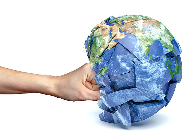 istock human hand strikes the planet earth 470432832