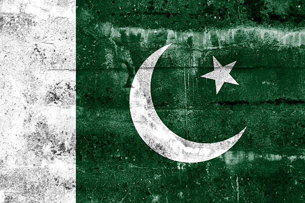 Pakistan Flag painted on grunge wall