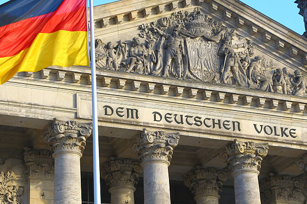 istock Close-up of Bundestag with german flag, Berlin 470434573