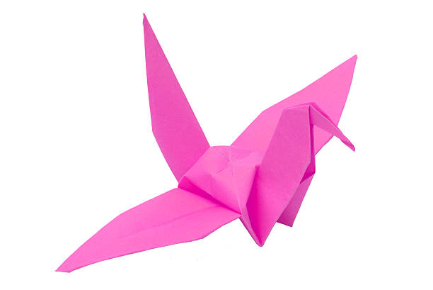 istock Pink origami bird on white background 470435023