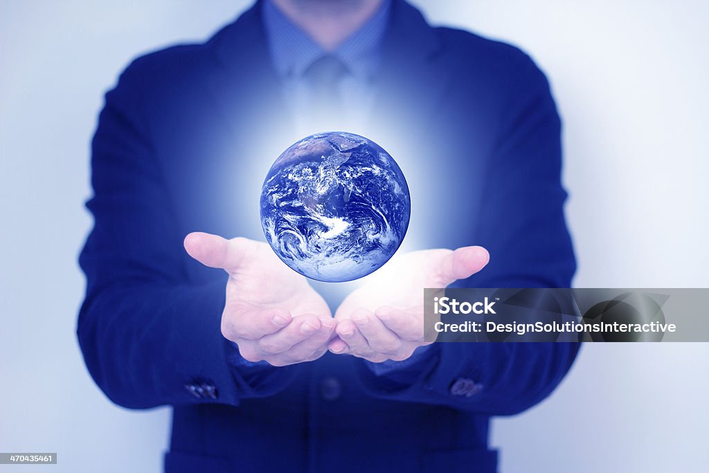 World in my hands Businessman Stock Photo