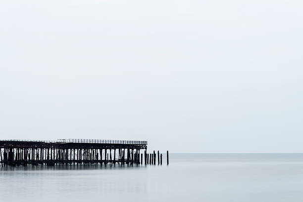 istock Sunrise minimalist landscape of pier under construction and deve 470435994