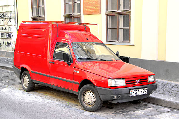 Budapest, Hungary - July 25, 2014: Red light truck Fiat Fiorino parked at the city street.