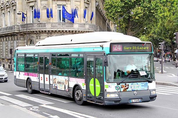 Renault Now S CNG Paris, France - August 8, 2014: City bus Renault Agora S GNV drives at the city street. bus livery stock pictures, royalty-free photos & images