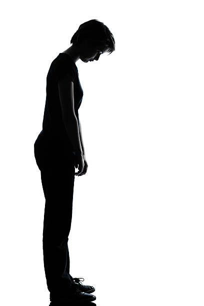 istock one young teenager girl sad looking down silhouette 470436521