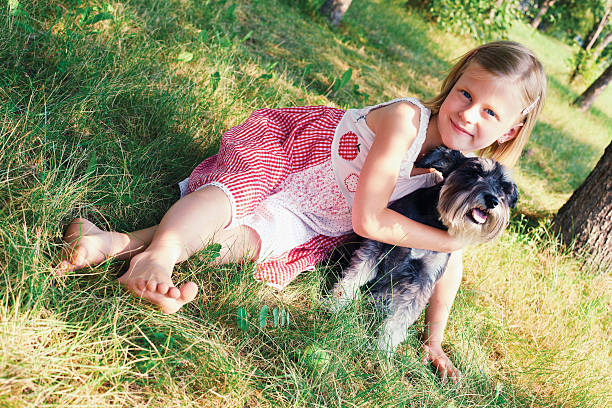 istock girls and a dog 470436685