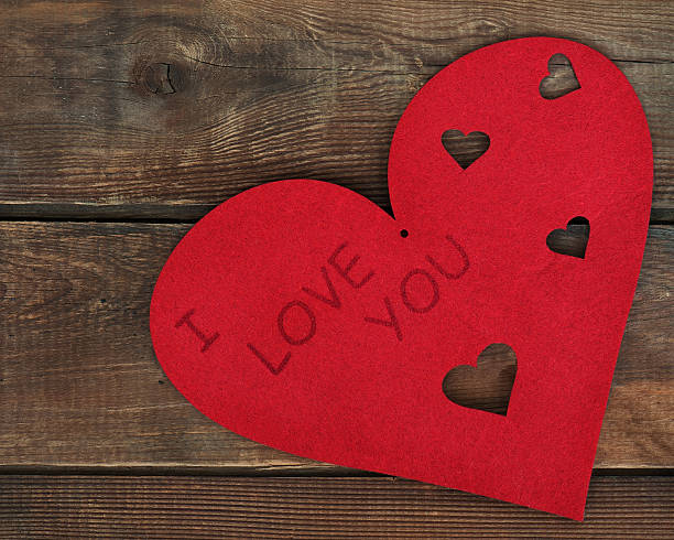 istock Red heart on wooden background. 470438847