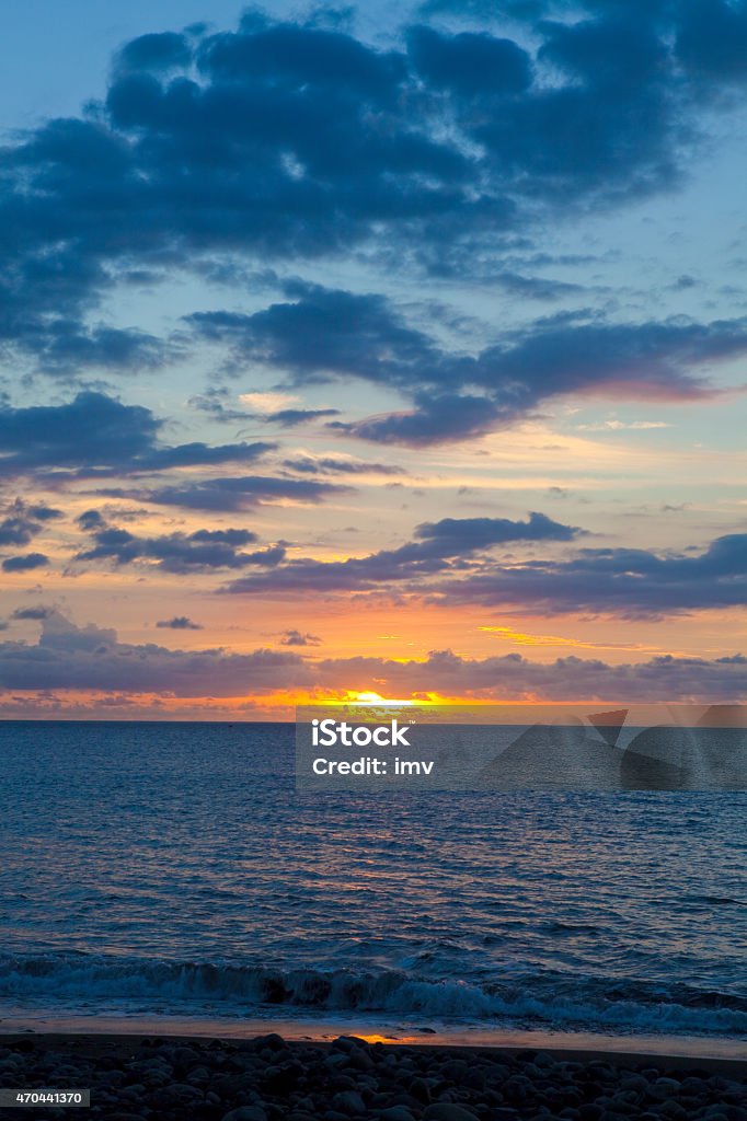 Reunion Island Sunset Sunset in Reunion island vertical composition image. 2015 Stock Photo