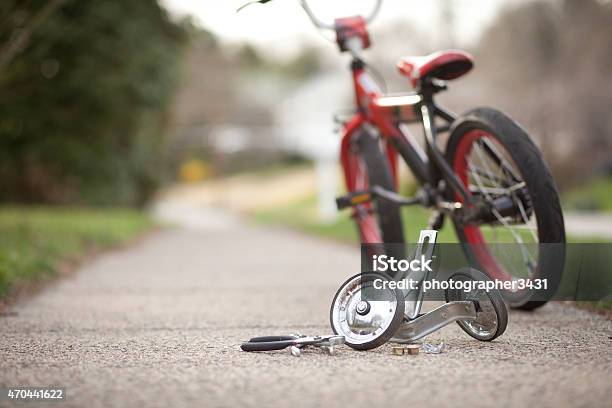 Training Wheels Taken Off Bike Stock Photo - Download Image Now - Absence, Bicycle, Child