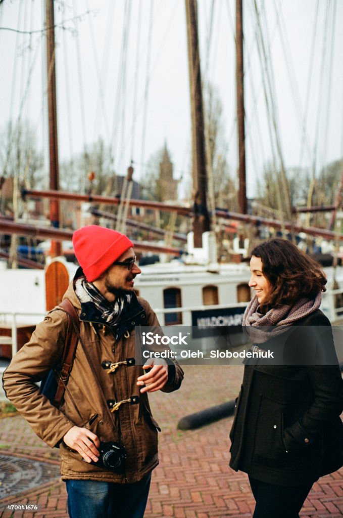 Man on the pier Man looking at the canals of Amsterdam Adult Stock Photo