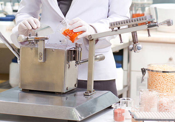 istock Pharmacist holding tube in a lab 470441764
