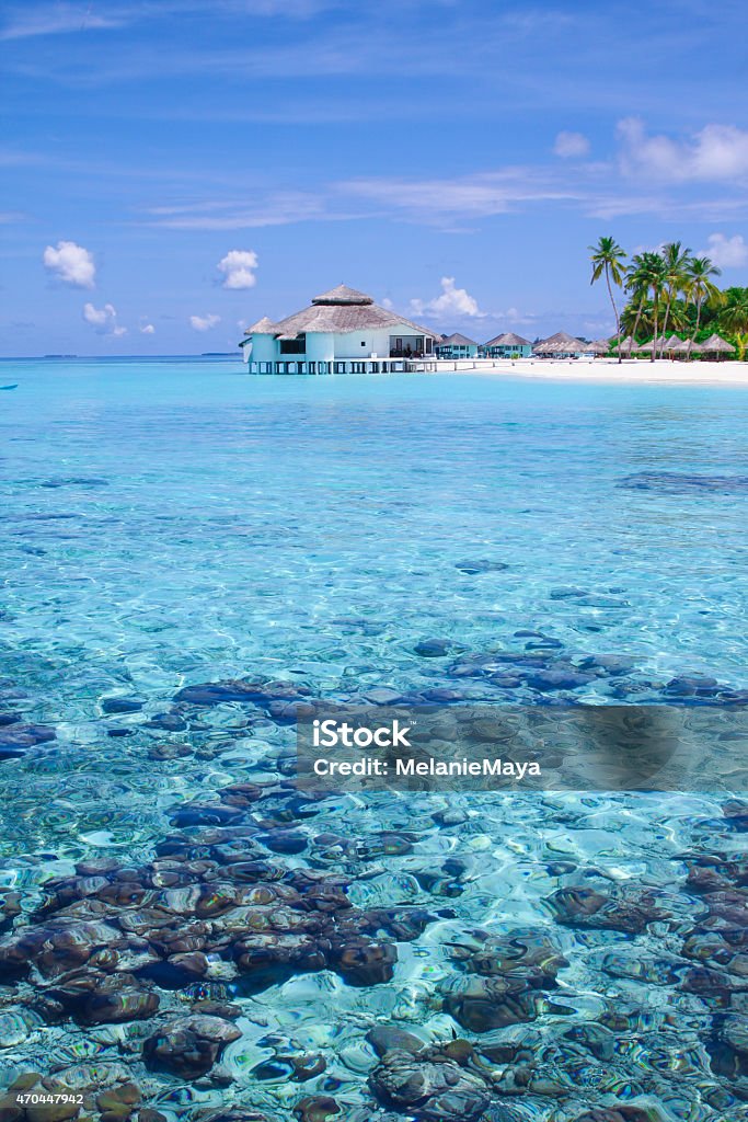 Maldives Dream Island Calm light blue lagoon, inviting for a swim in a Maldivian Luxury Resort Maldives Stock Photo